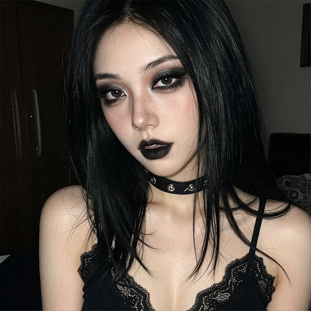 Fictional AI character with long black hair, dark lipstick and a studded choker, photographed close up in a dim room